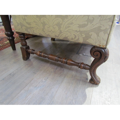 7654 - A Georgian style triple hump back sofa, oak frame, foliate design upholstery