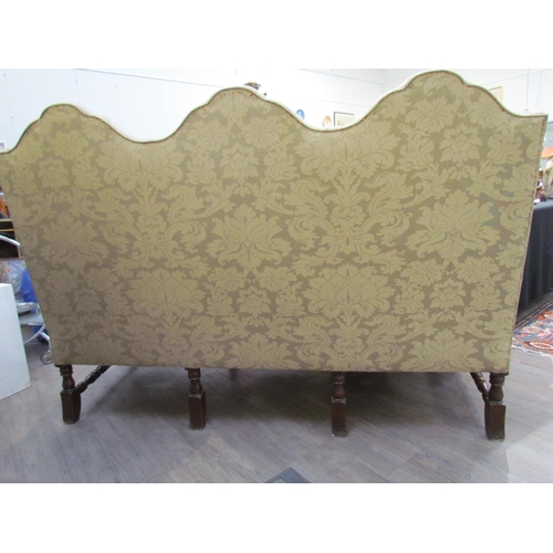 7654 - A Georgian style triple hump back sofa, oak frame, foliate design upholstery