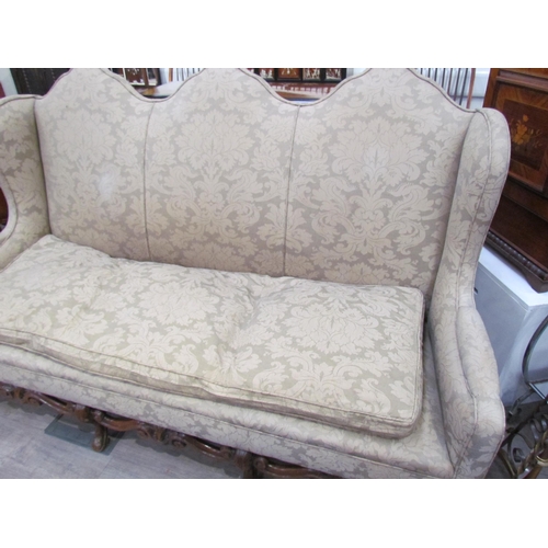 7654 - A Georgian style triple hump back sofa, oak frame, foliate design upholstery