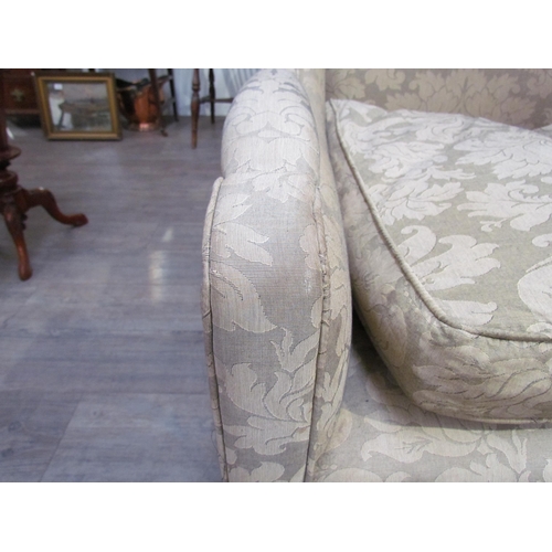 7654 - A Georgian style triple hump back sofa, oak frame, foliate design upholstery