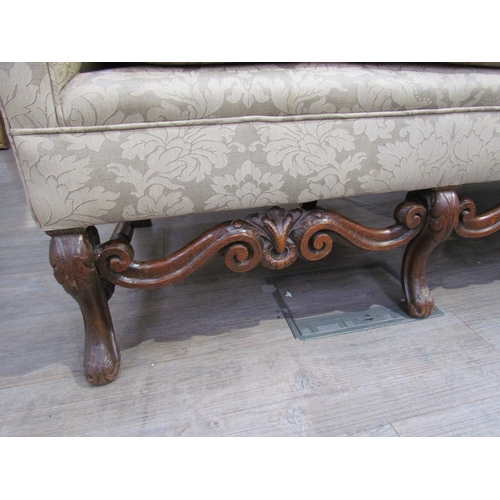 7654 - A Georgian style triple hump back sofa, oak frame, foliate design upholstery