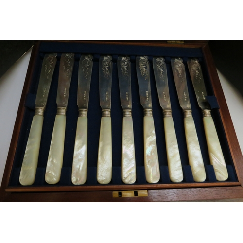 7262 - A Victorian Atkin Brothers 24 piece mother-of-pearl and silver fish knife and fork set, Sheffield 18... 