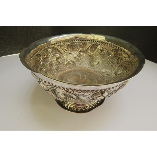 7362 - A Dutch silver footed bowl, repousse scrolled foliage and crown detail, 141g