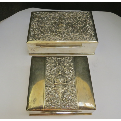 7367 - Two Thai silver cigarette boxes, one by H. Sena & Co, Bangkok, the other by Alex & Co, Bangkok both ... 