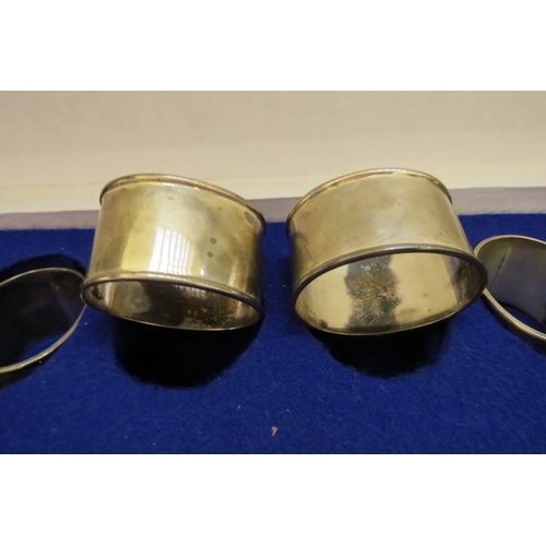 7372 - A set of six sterling silver napkin rings, all monogrammed CE, in fitted box, 392g