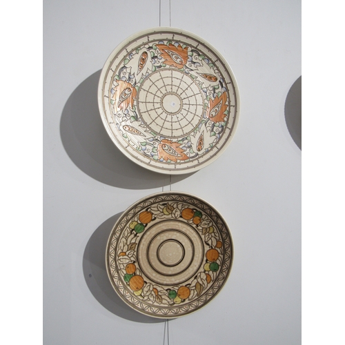 7748 - Two Charlotte Rhead chargers, both for Crown Ducal. Fruit and Vine border pattern 5802 and Webb & Le... 