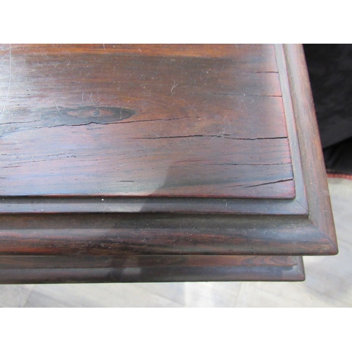 7750 - A Victorian rosewood sewing table, rectangular top, fret carved trumpet form, 73cm high