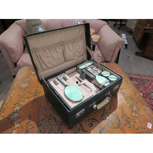 7755 - A Mappin & Webb silver and jade green guilloche vanity set within a fitted case, London 1947