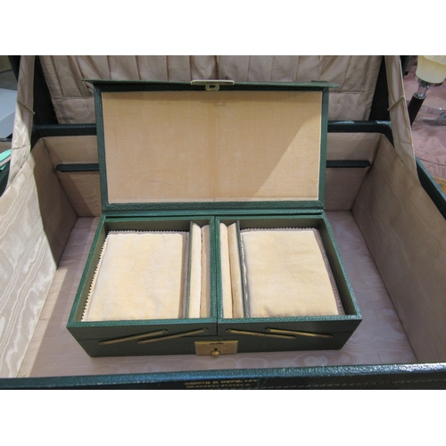 7755 - A Mappin & Webb silver and jade green guilloche vanity set within a fitted case, London 1947