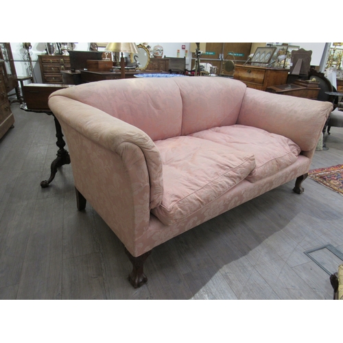 7760 - A Howard & Sons sofa on claw and ball feet, rear legs stamped, 84cm wide