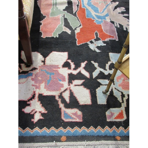 7847 - A hand-woven black ground carpet, 325cm x 240cm