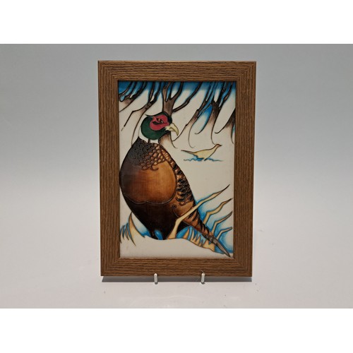 7580 - A Moorcroft framed plaque 