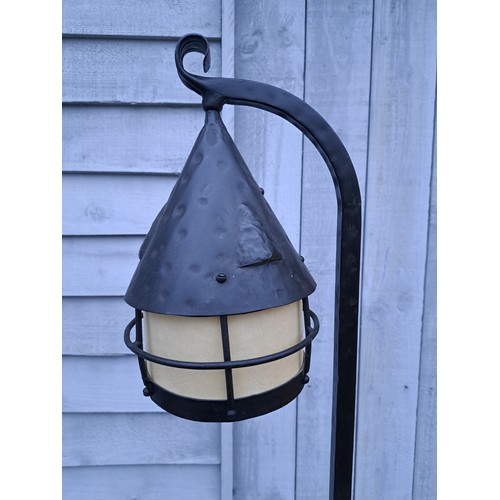 7582 - A wrought iron standard lamp as a tavern lantern