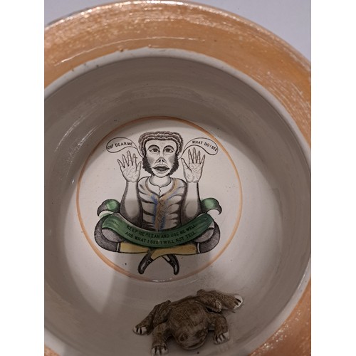 7515 - A circa 1830 Sunderland character chamber pot with mottos around the side and inside with a watchful... 