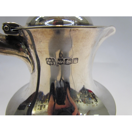 7404 - A Z. Barraclough & Son silver hot water jug with ebony handle and knop, 21cm tall, Sheffield 1922, 4... 