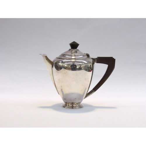 7410 - A Henry Clifford Davis silver hot water jug of Art Deco form with Bakelite handle and knop, Birmingh... 