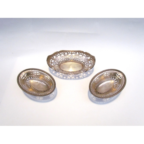 7411 - Three Alexander Clarke Manufacturing Co. silver pierced dishes, two with pedestal bases, all with pi... 