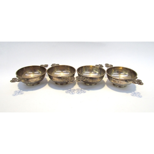 7413 - A set of four Sibray, Hall & Co Ltd silver cruet/condiment bowls with clover leaf handles, Sheffield... 