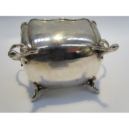 7415 - A Charles Westwood and Sons silver twin handled sucrier, raised on four swept feet, Birmingham 1907,... 