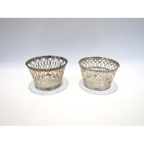 7417 - Two William Comyns & Sons silver baskets, each with a different pierced design, 8cm diameter, 5cm hi... 