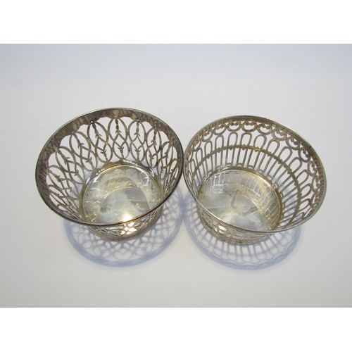 7417 - Two William Comyns & Sons silver baskets, each with a different pierced design, 8cm diameter, 5cm hi... 