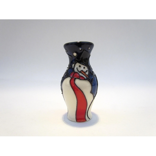 7425 - A Moorcroft miniature Snowman pattern vase, 5.5cm tall  (R)  COLLECTED