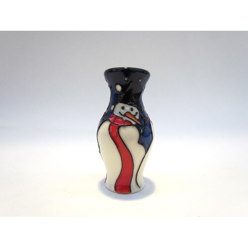 7425 - A Moorcroft miniature Snowman pattern vase, 5.5cm tall  (R)  COLLECTED