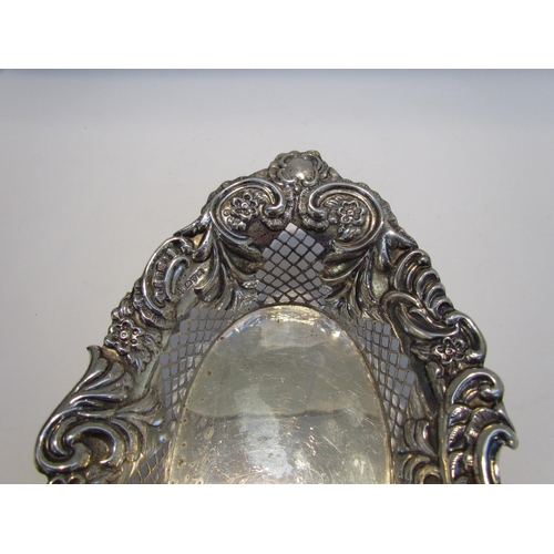 7430 - A George Nathan and Ridley Hayes silver pierced and embossed oval basket, scroll and floral decorati... 