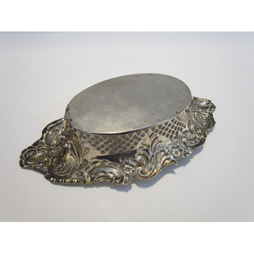 7430 - A George Nathan and Ridley Hayes silver pierced and embossed oval basket, scroll and floral decorati... 