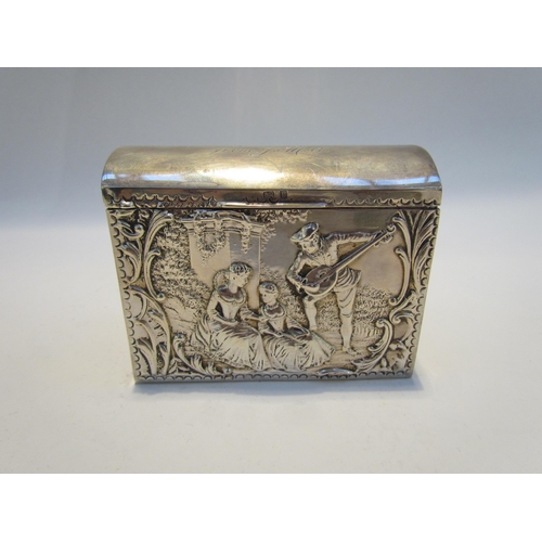 7431 - A Henry Matthews silver playing card box, embossed design of musician playing to seated ladies to fr... 