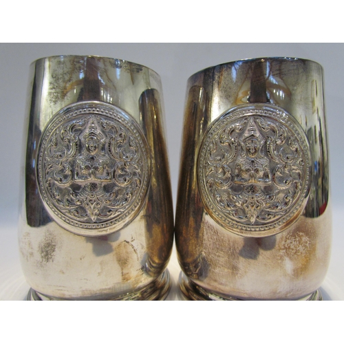 7435 - Two H. Sena of Bangkok sterling silver tankards with emblem to front, boxed, 13cm tall, 423g