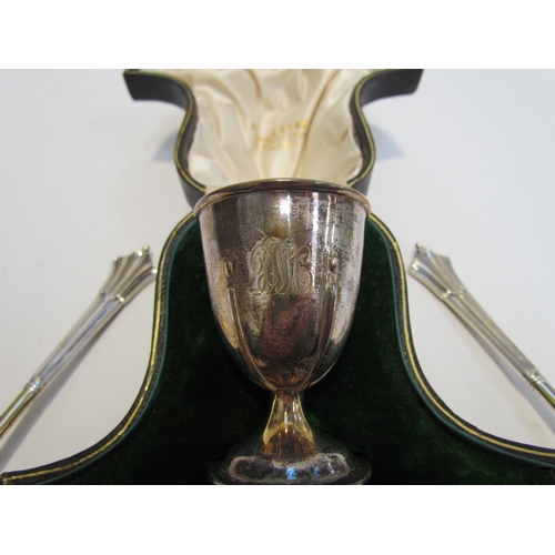 7217 - A Casel Mappin & Webb silver egg cup and spoon with monogram initials London 1913 and a pair of scal... 