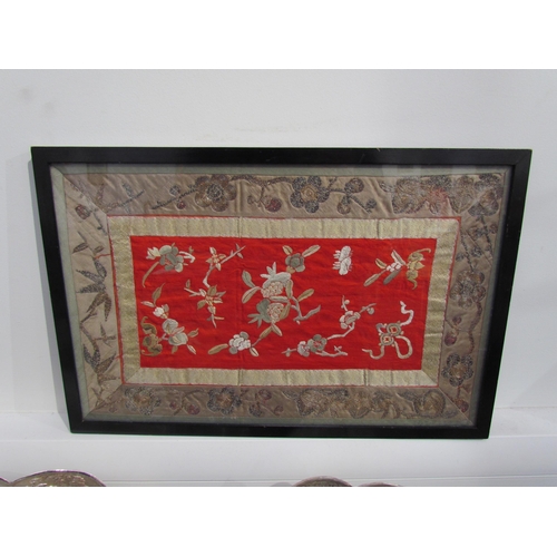 7472 - Two Oriental metal embroidered pictures depicting an exotic bird surrounded by clouds and the other ... 