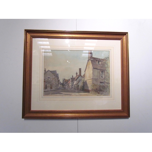 7583 - FREDERICK WILLIAM BALDWIN (1899-1984): A watercolour of Framlingham, Castle Street, signed lower-lef... 