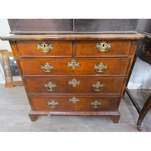 7604 - An 18th Century walnut diminutive chest of two short over three long drawers, brass handles and fret... 