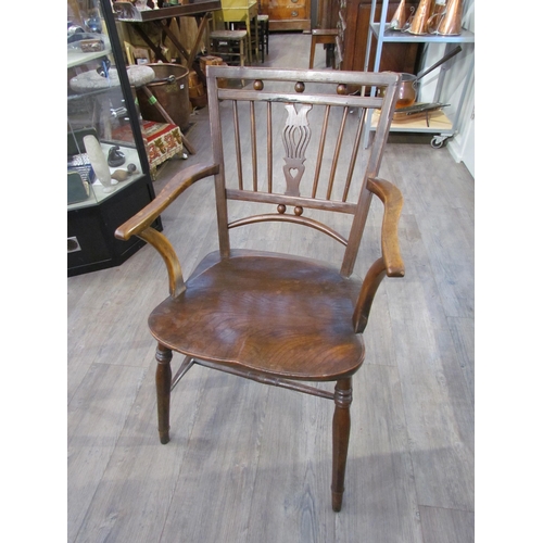 7607 - A 19th Century Mendlesham chair, shaped seat, H stretcher base, repair present