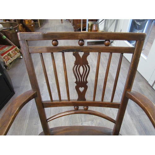 7607 - A 19th Century Mendlesham chair, shaped seat, H stretcher base, repair present