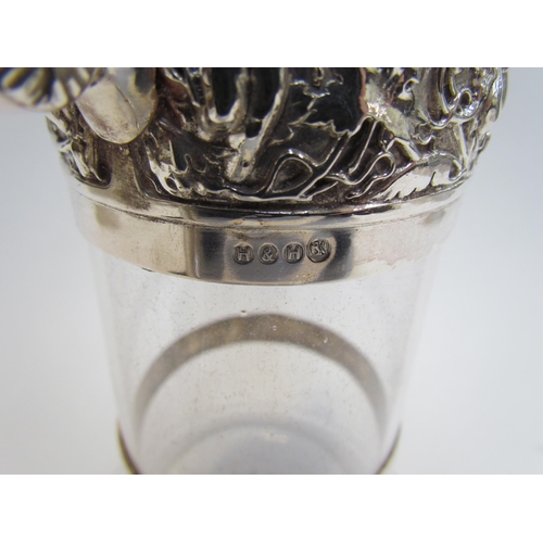 7609A - A Hukin & Heath silver plated glass carafe with border of cherubs and putti playing, lion and shield... 