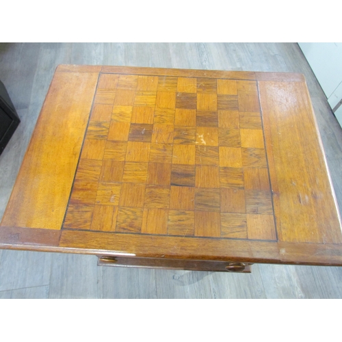 7613 - A rectangular veneered sewing table with chess board top on turned legs, a/f, 64.5cm x 51cm x 36cm