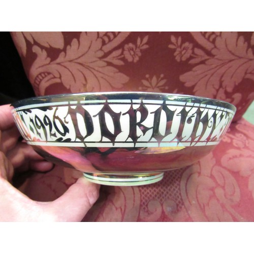 4272 - An early 20th Century lustre pottery bowl, the interior painted with a galleon, the exterior with de... 