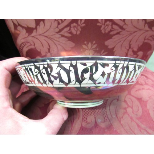 4272 - An early 20th Century lustre pottery bowl, the interior painted with a galleon, the exterior with de... 