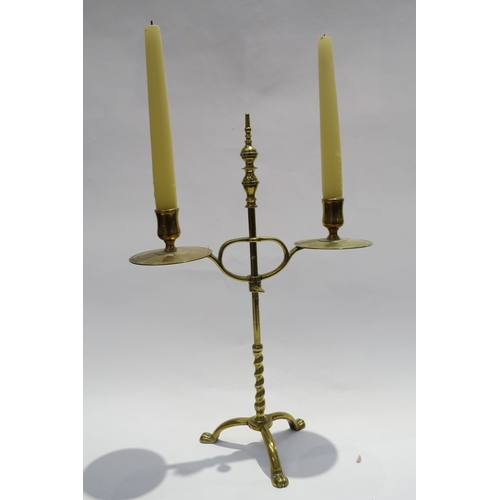 7233 - A pair of 19th Century twin sconce adjustable height brass table candlesticks with tripod paw feet b... 