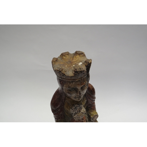 7237 - A 18th Century carved polychrome figure of the 