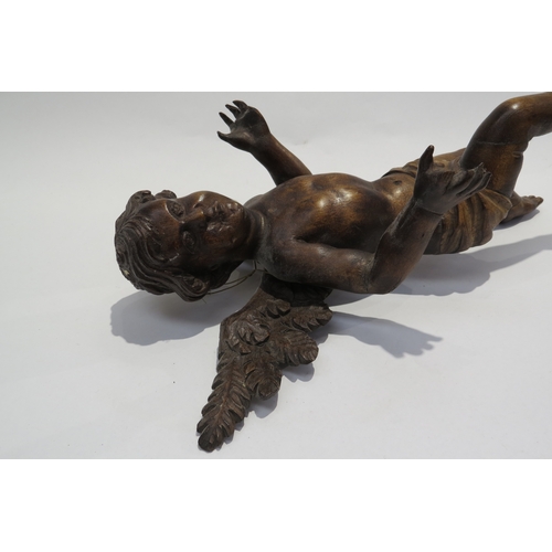 7239 - A 19th Century fruitwood angel figure, damage to fingers, 35.5cm tall, 27.5cm wide, 16cm deep