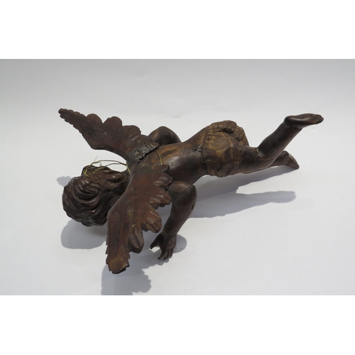 7239 - A 19th Century fruitwood angel figure, damage to fingers, 35.5cm tall, 27.5cm wide, 16cm deep