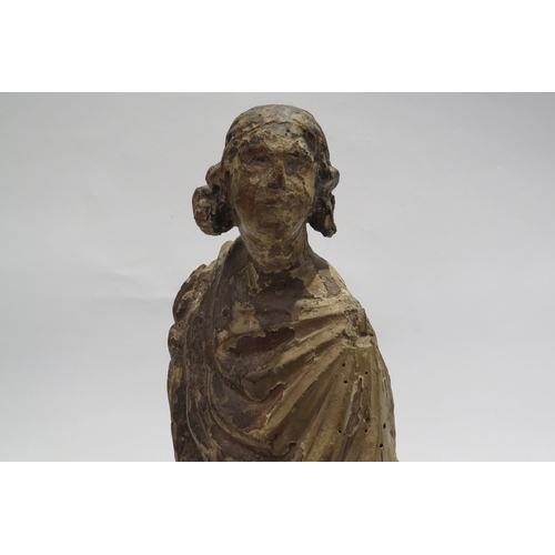 7240 - A 17th Century European carved lime wood figure of a saint in a time worn state mounted on a marble ... 