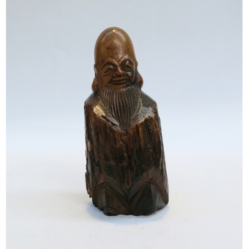 7244 - A Japanese wood carving of Fukurokyju one of the seven lucky Gods, 11cm tall x 5cm x 5cm