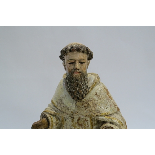 7249 - An 18th Century Spanish polychrome Saint carved wood figure in white cuculla robe, 37cm tall, 16.5cm... 