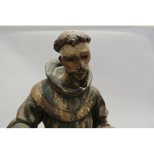 7250 - A 17th Century Spanish polychrome sculpture of Francis of Assisi in a time worn state with estofado ... 