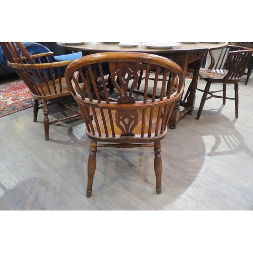 7754 - A 19th Century elm hoop back Windsor chair, H stretcher base   (R) £200